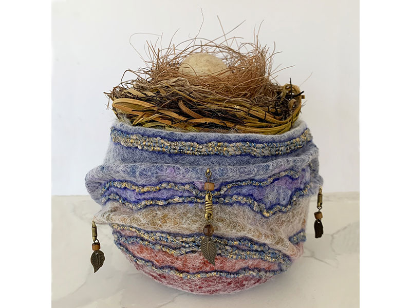 Vessel with Egg in Merino wool by Janice Snider